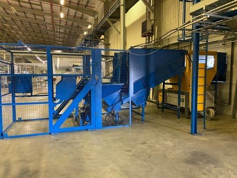 Processing and baling equipment at the facility.